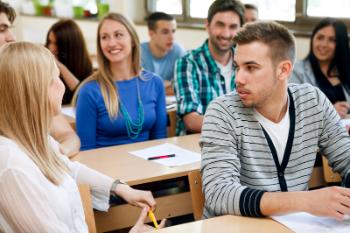 Post-Secondary Education students in classroom having conversation